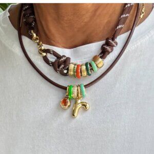 Roxanne Assoulin Brown Cord Layered Necklace with Green and Orange Accents